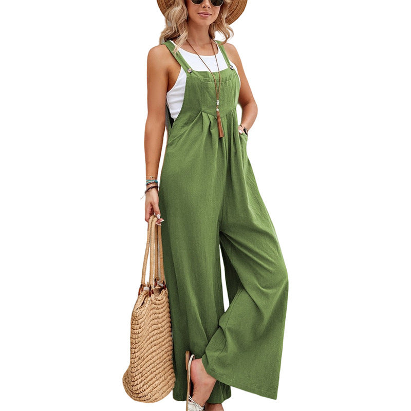 Faye groene tuinbroek outfit dames, model tegen muur. Villano mode