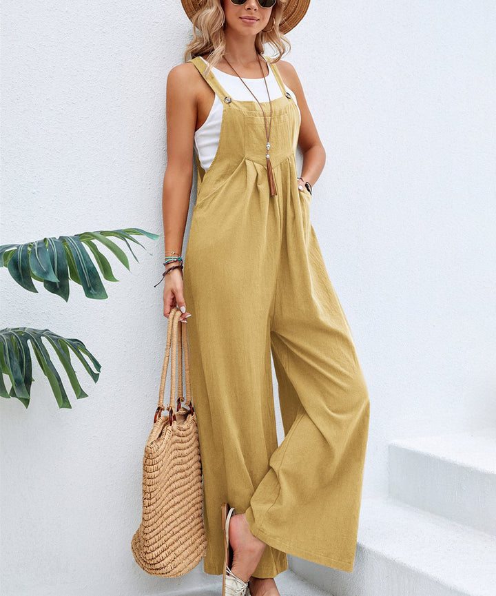 Faye gele tuinbroek outfit dames, model tegen muur. Villano mode