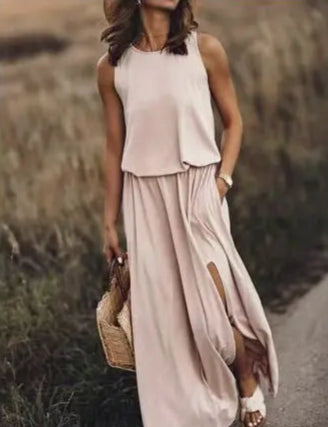 Beige lange zomerjurk met O-hals en kwastjes