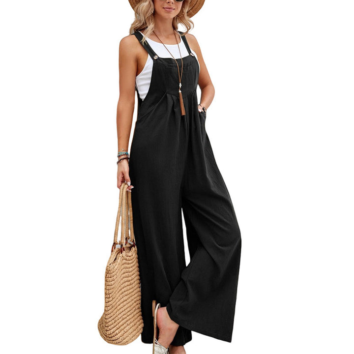 Faye zwarte tuinbroek outfit dames, model tegen muur. Villano mode